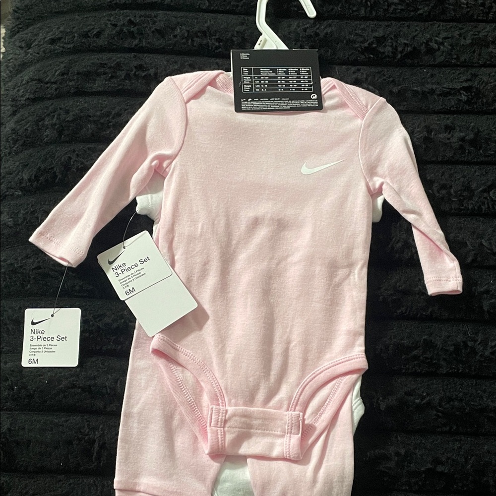 Nike Light Pink Baby Bodysuit